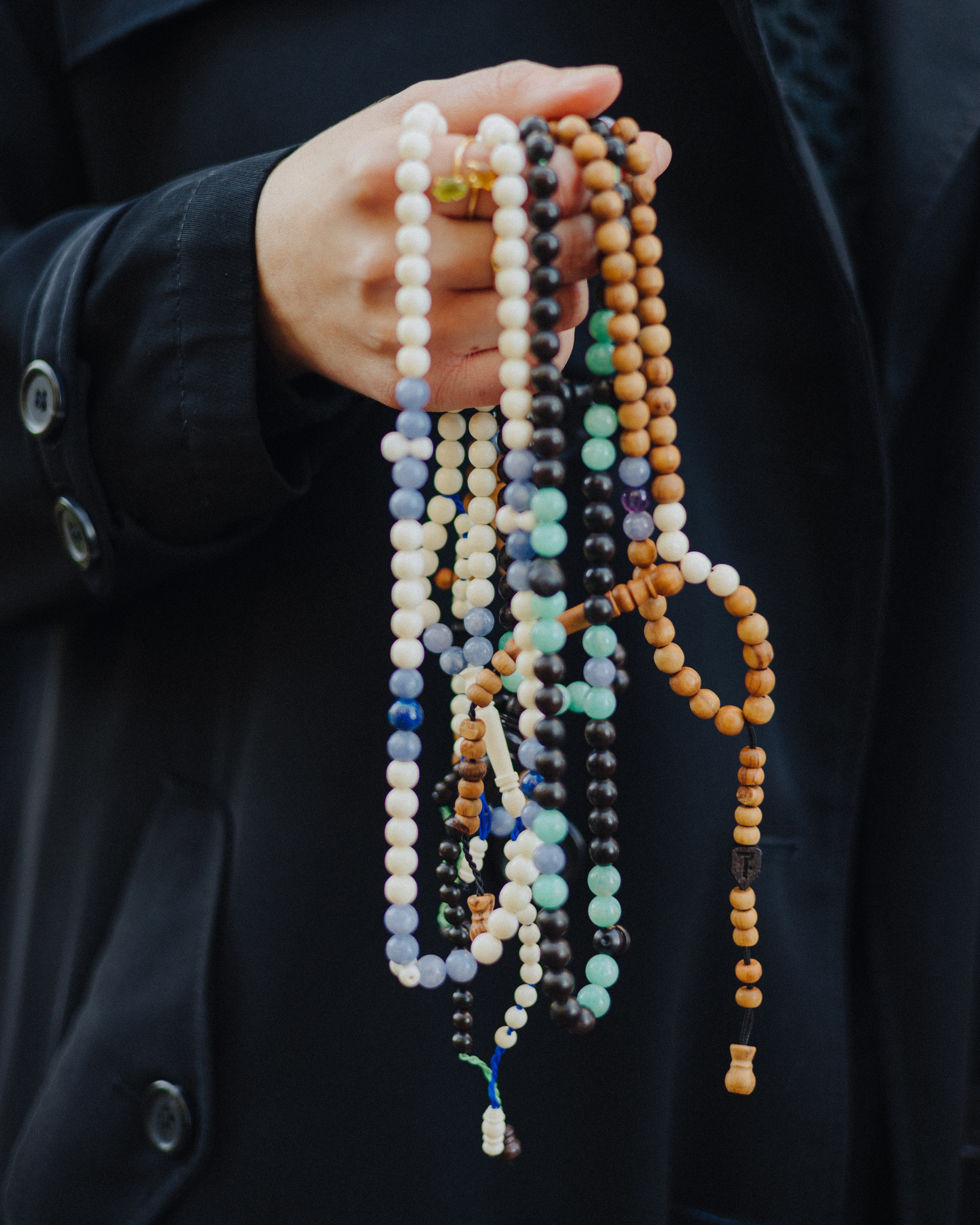 Hand holding collection of sibhas